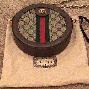 Gently used Gucci handbag with metal chain